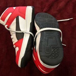 As is used  Puma Red and White High-Top Sneakers